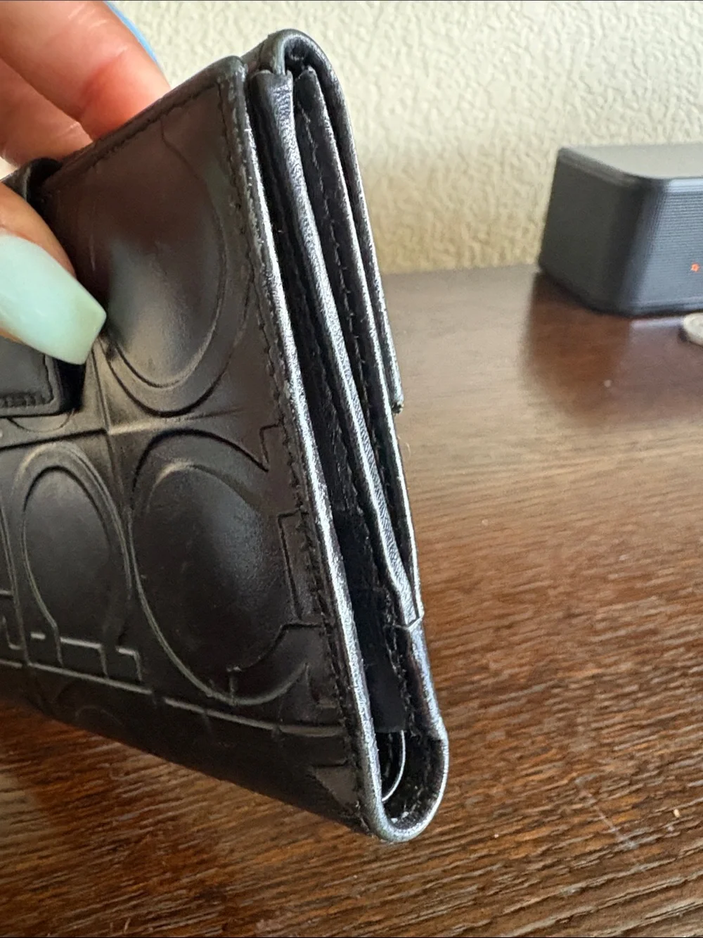 Salvatore Ferragamo Gancini Embossed Leather Bifold Wallet - Black